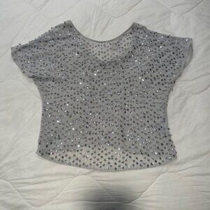 Jennifer Lopez sequin short sleeve top